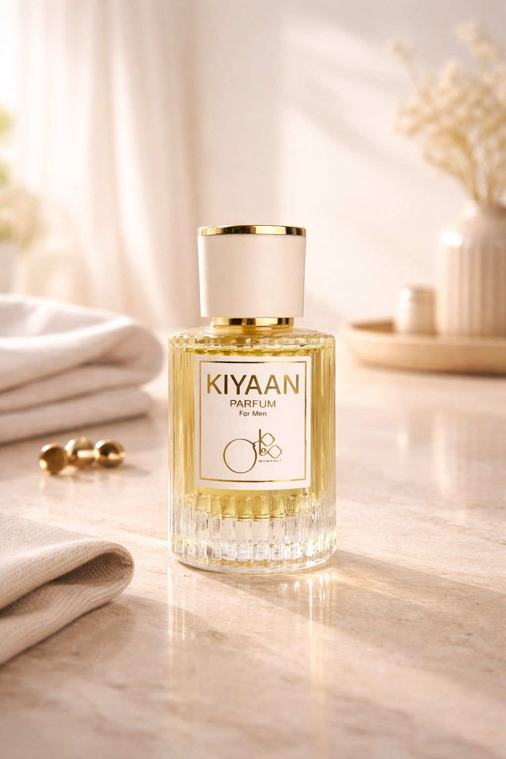 KIYAAN perfume bottle on a light surface with soft background